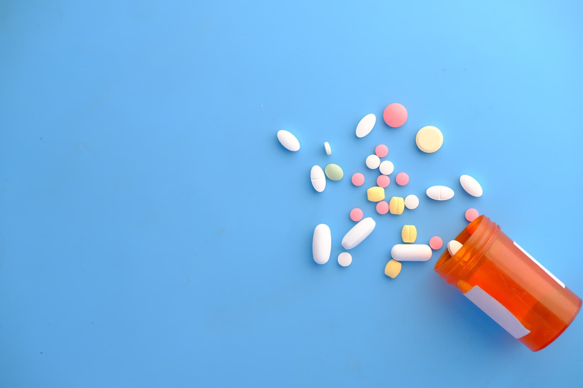 Picture of medication bottle and pills